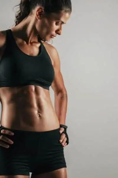 Toning Up at Home: The Ultimate Guide to Bodyweight Exercises 2 Image of woman's toned stomach after bodyweight exercises Woodley and non-surgical treatment from Lipo 360