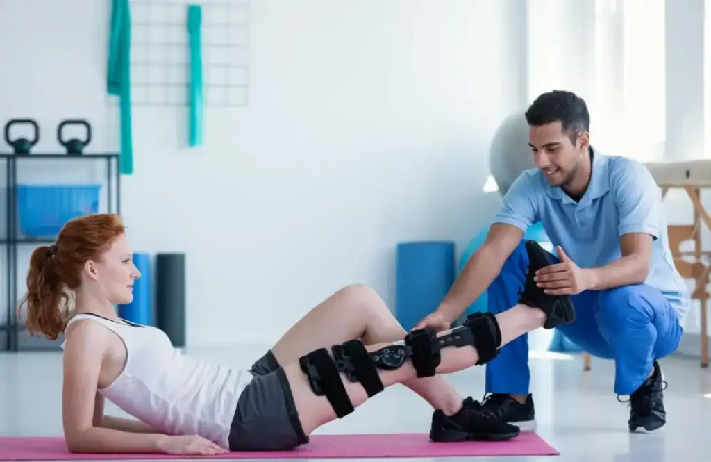 Woman having treatment to help muscle recovery Woodley  after an injury