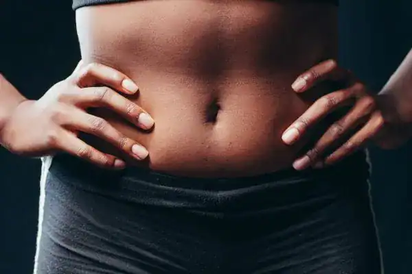Toning Your Stomach: The Ultimate Guide to Achieving a Sculpted Stomach While Shedding Pounds 1 Image of a toned stomach after non surgical treatment Woodley